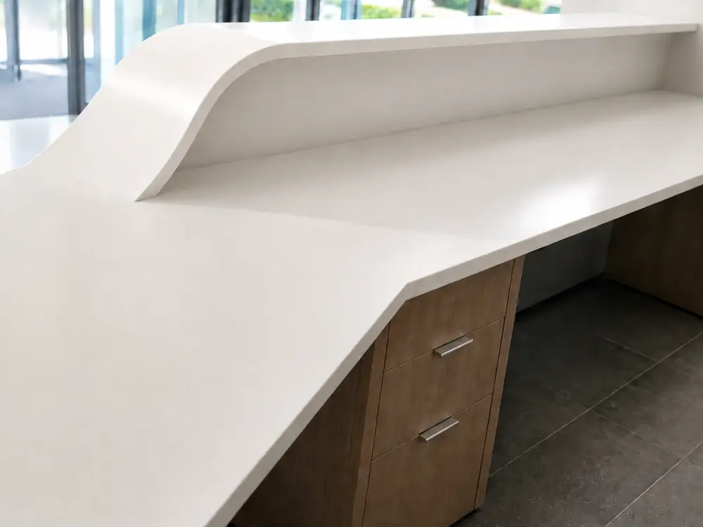Thermoformed solid surface transaction top fabricated by SolidSurface Designs